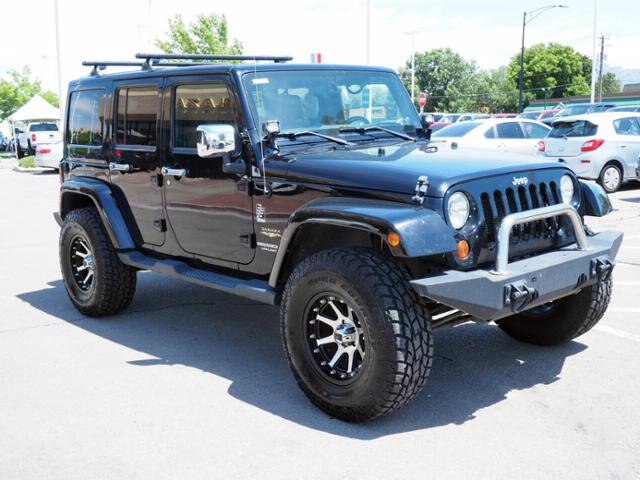 Pre-Owned 2012 Jeep Wrangler Unlimited Sahara 4WD SUV